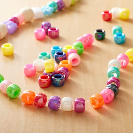 12 Packs: 580 ct. (6,960 total) Aurora Borealis Pony Beads by Creatology™, 6mm x 9mm